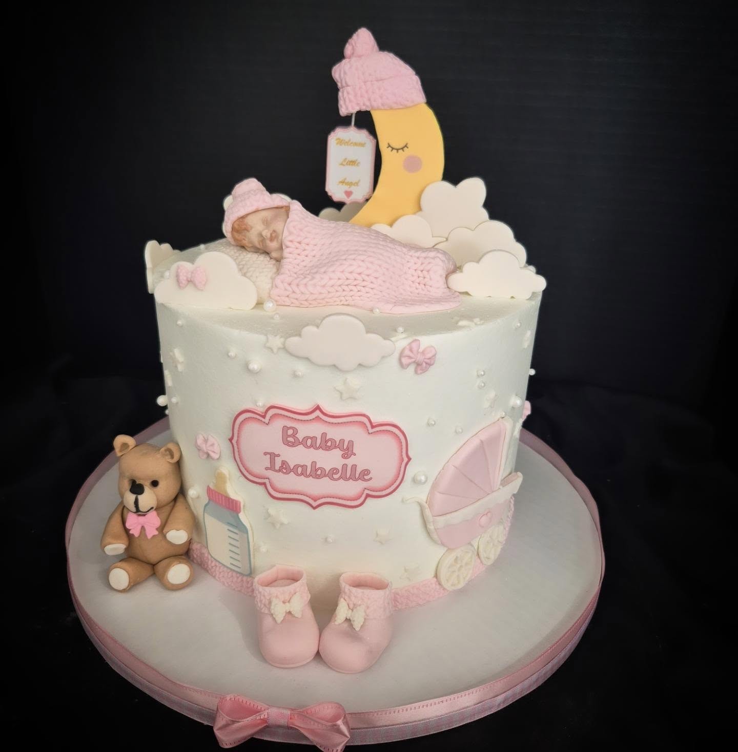 Hand-sculpted baby shower cake by Cake Me to Paradise